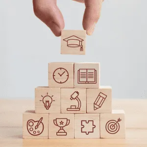 A pyramid of wooden blocks with different symbols on them