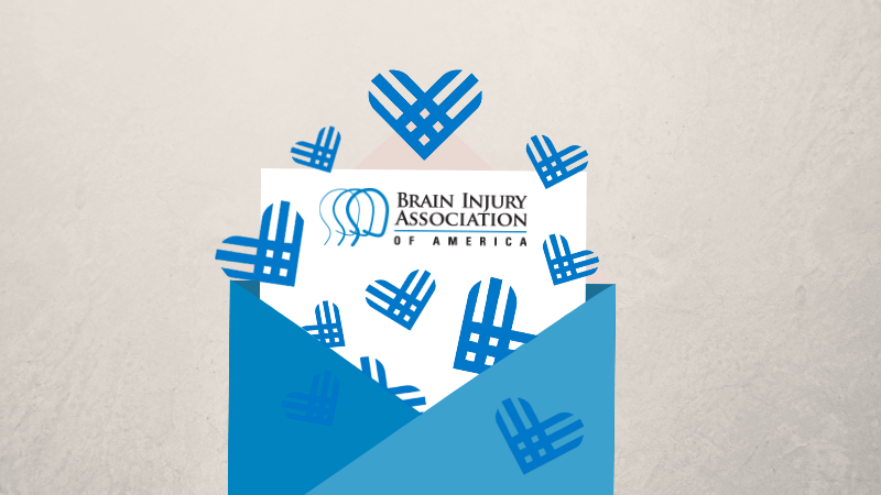 Picture of BIAA logo on letterhead popping out of blue envelope with blue hearts.