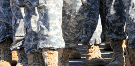 Group of military servicemembers walking.