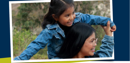 mother with her young child sitting on her shoulders